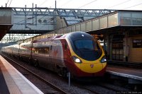 Virgin Trains (VIG) train - Pendolino races through Milton Keynes