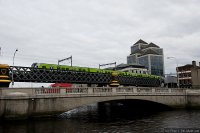 Dublin Area Rapid Transport (DART) train - DART train on the Loopline Bridge across River Liffey in Central Dublin